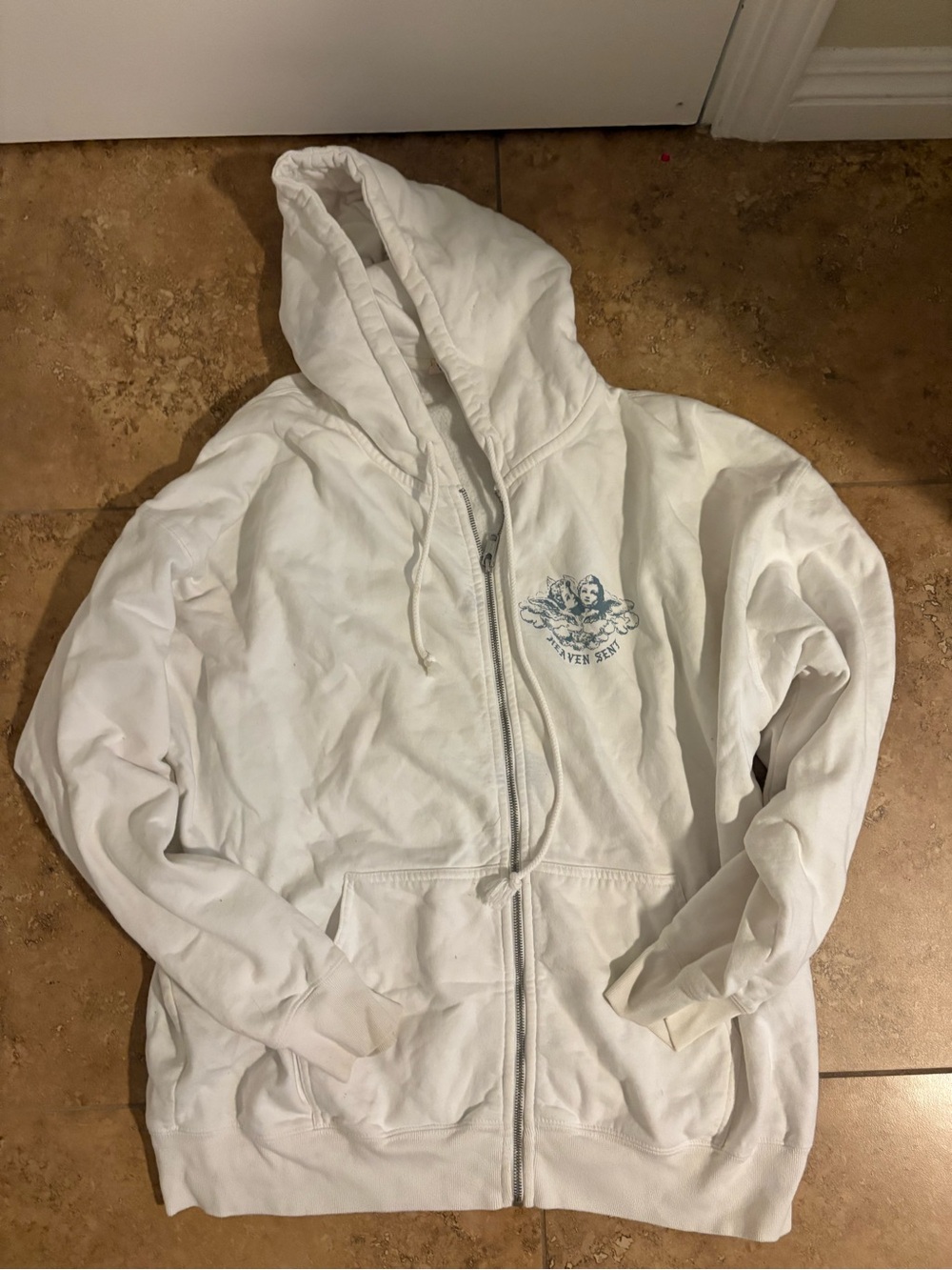 Brandy Melville White Zip-Up Hoodie with Small Blue Chest Graphic